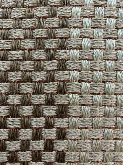 Tapete tejido Canasto combinado en Fique a doble tono con detalle en cobre
